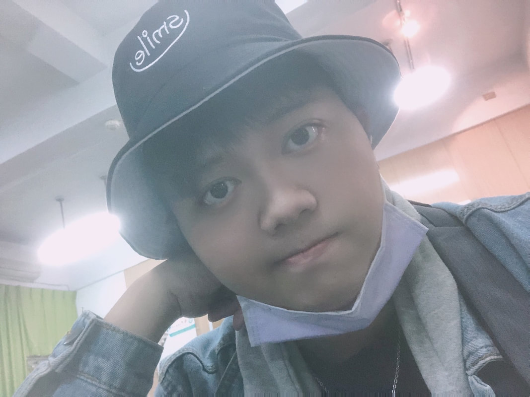張纮緁